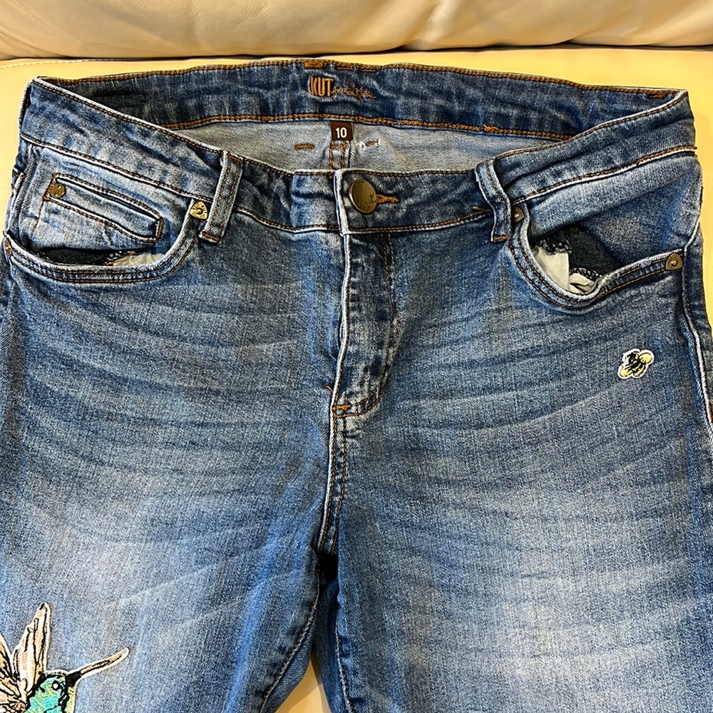 Kut jeans with embroidered patches.